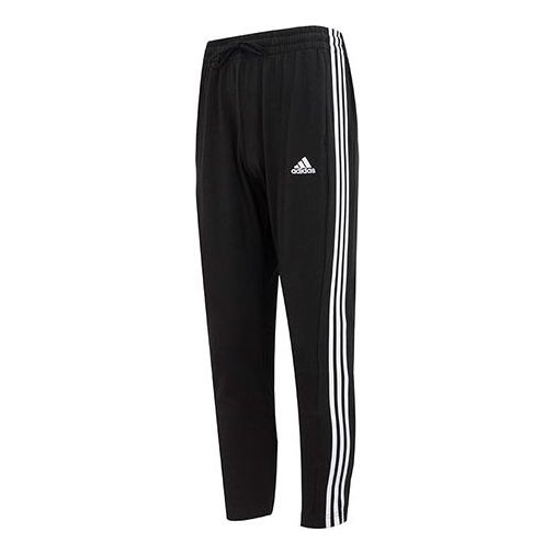 بنطال adidas Logo Essentials Single Jersey ذو الحاشية المفتوحة والمُخطط بثلاثة خطوط IC0044
