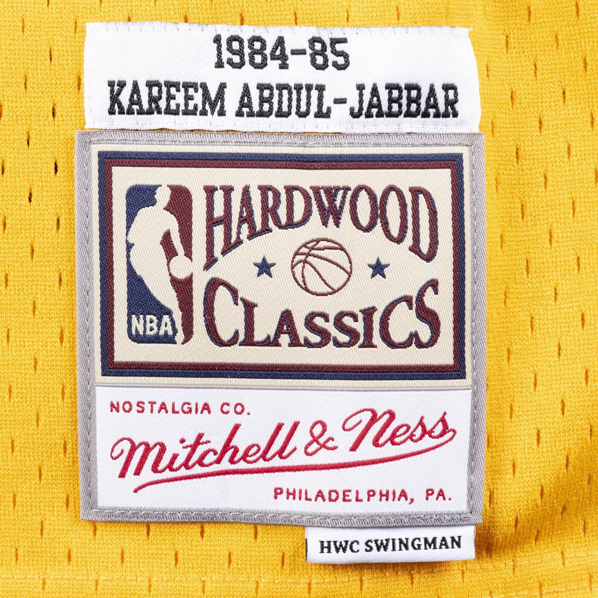 Mitchell & Ness x NBA Los Angeles Lakers 1984-85 Swingman Jersey 'Kareem Abdul-Jabbar 33' SMJYAC18110-LALLTGD84KAB
