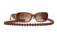 CHANEL Plate Frame Irregular Shape Sunglasses Women's Brown
